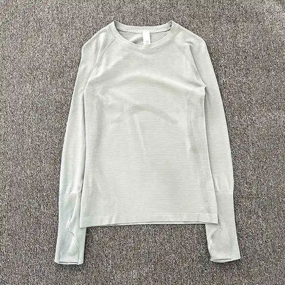 Yoga clothing top for women in spring and autumn, slim fit, long sleeved, running, Pilates training, fitness clothing